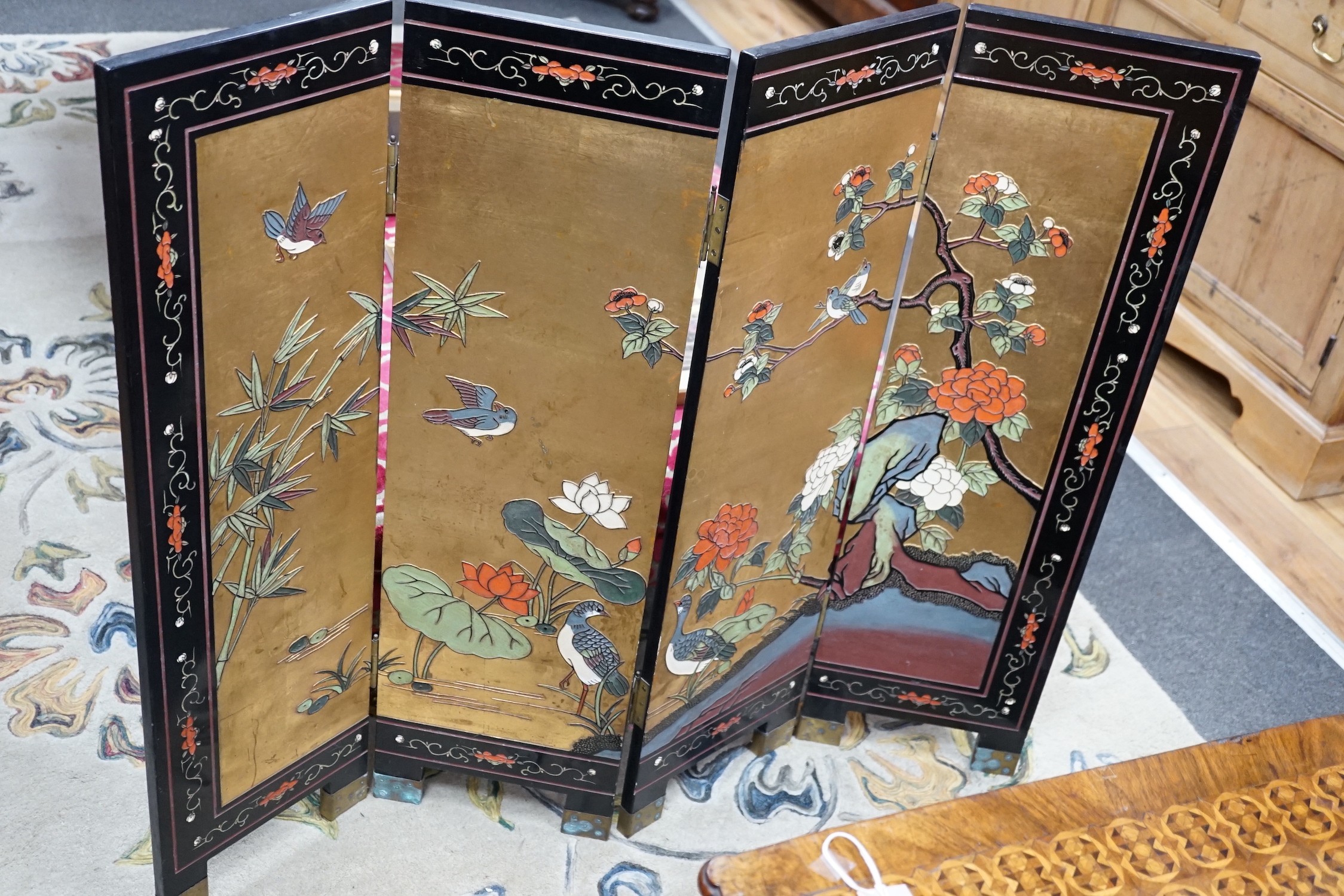 A Chinese ‘coromandel’ lacquer low four fold screen, height 92cm *Please note the sale commences at 9am.